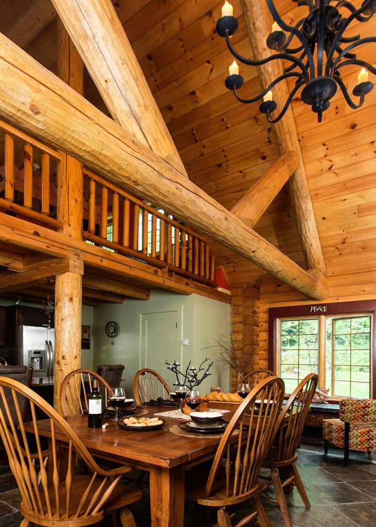 Beaver Mountain Log Homes Tumbleweed Log Home Dining Room and Timber Trusses