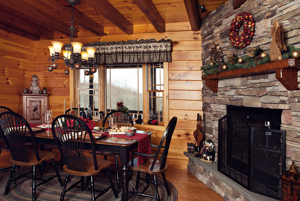 Beaver Mountain Log Homes Overlook Retreat Log Home Dining Area and Stone Fireplace
