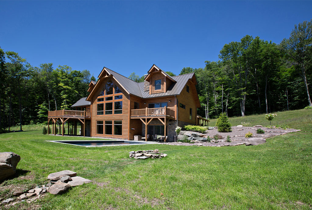 Beaver Mountain Log Homes Valley View Log Home Exterior and Lawn