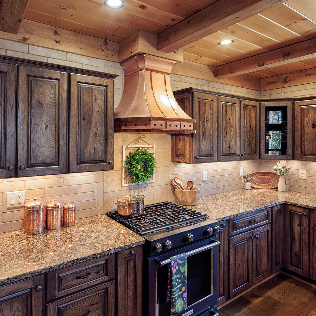 Beaver Mountain Log Homes Black Bear Lodge Timber Home Kitchen Stove and Copper Hood