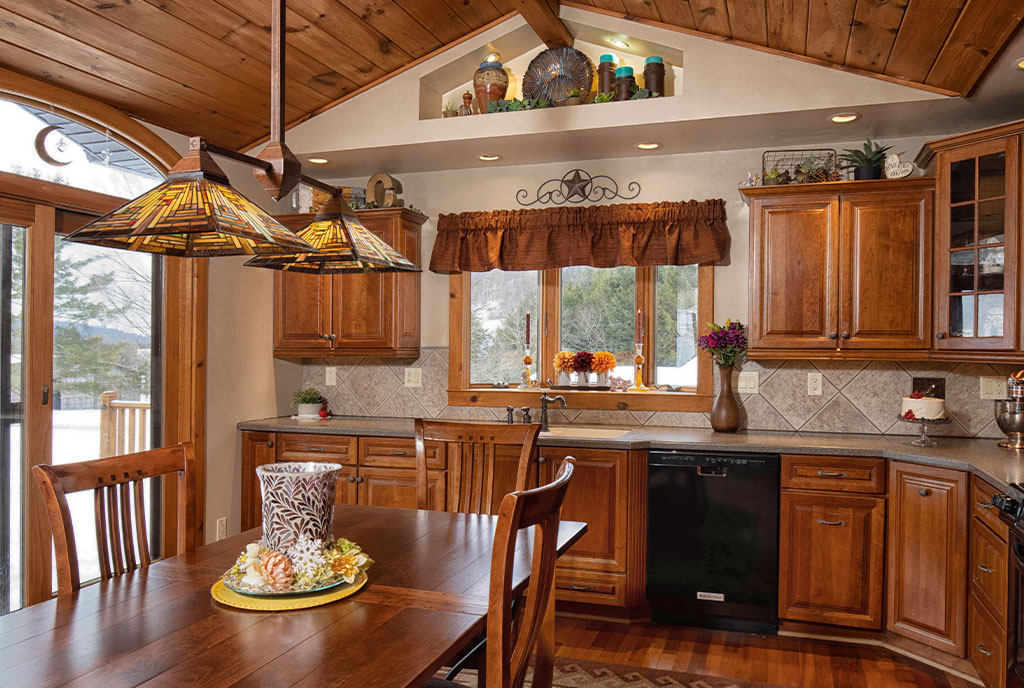 Beaver Mountain Log Homes Meadowbrook Ranch Log Home Kitchen and Dining Table